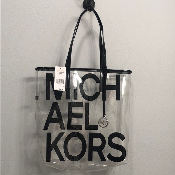 Michael Kors Handbags - Michael Kors Clear Purse W/ Matching mini bags